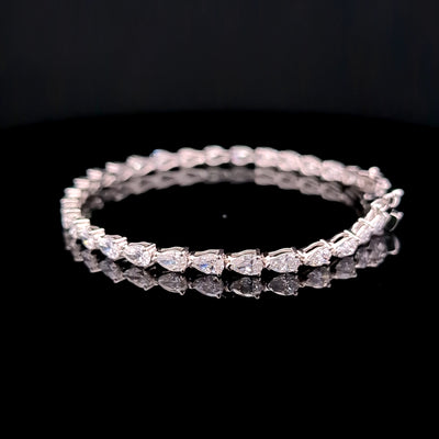 E-W PEAR TENNIS BRACELET 14KW EF VS1 HPHT DIA 7.47 CTS