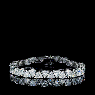 S-N TRILLION SHAPE TENNIS BRACELET 14KW FG VS CVD DIA 16.1CTS