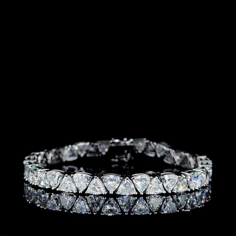 S-N TRILLION SHAPE TENNIS BRACELET 14KW FG VS CVD DIA 16.1CTS