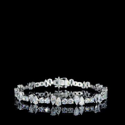 ROUND & PEAR SHAPE TENNIS BRACELET 14KW FG VS CVD DIA 7.74CTS