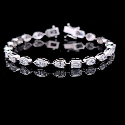 MULTI SHAPE TENNIS BRACELET 14KW FG VS1 CVD DIA 5.86CTS